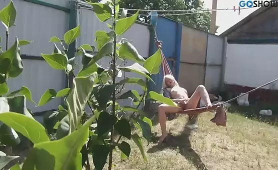 Outdoor Blonde Masturbates in Hammock
